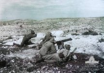 Four unidentified members of the 3rd Australian Light Horse Regiment machine gun in action at Kh.jpg