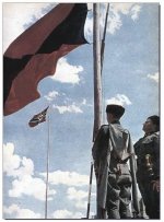 The Cossack flag flies alongside that of Nazi Germany.jpg