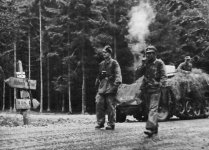 kampfgruppe_knittels_troops_on_the_road_to_stavelot.jpg