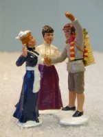 TROPHYOFTEXASTheMistleToeSellerThreefigureChristmassetset.jpg