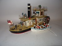 UnderTwoFlagsSternWheelPaddleSteamerModel.jpg