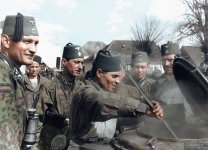 Men_of_the_Handschar_division_waiting_for_food_in_the_Balkan_Mountains,_Bosnia,_March_1944._(4...jpg