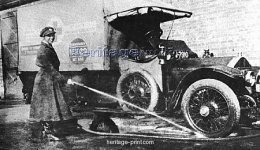 volunteer_english_woman_driver_washing_down_her_ambulance_cambridge_world_war_i_1915_1226615.jpg