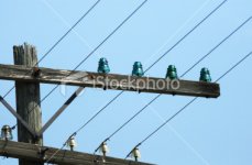 stock-photo-10275841-old-insulators-on-telephone-pole.jpg