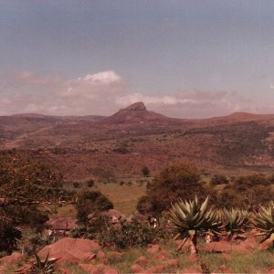 Ultimate holiday snap: Isandlwana from the west.   Rorke's Drift road visible on left.