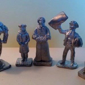 54mm civilians kits a 1800's woman, boy and woman singing, paper boy and his dog. Prices vary so please ask.