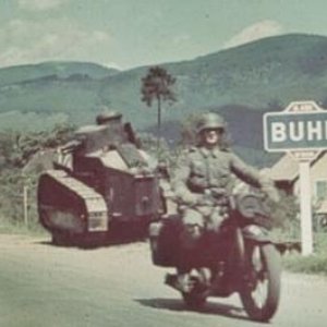 German dispatch rider passing a French FT 17