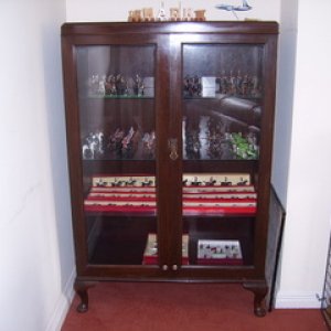 My Main Display Cabinet, converted this from a Mahogany Hall Wardrobe been in family for years, just took the panels out of the doors, put laminated g