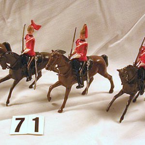 Britains # 2074 1st Kings Dragoon Guards. I have these tied in their box, but again best photo I can get for now.