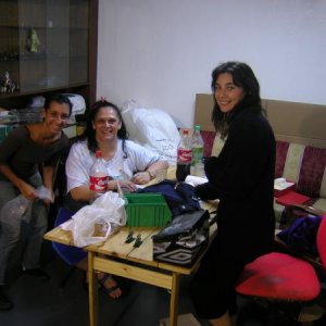 Lucila, Ana and Beau Geste painting manager Marcela.  Marcela is in charge of painters who paint off-site.