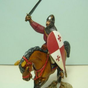 mounted crusader knight/man at arms converted from irregular miniatures hobilar figure with addition of sword/hand and shield.