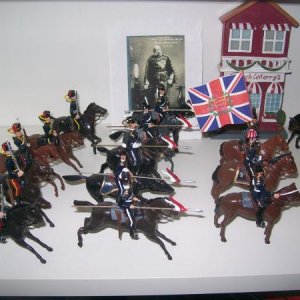 Restored old Britains in a light Brigade grouping,Most of these had arms,legs,tails,heads etc off,paint negligable to say the least.  Probably 15 more