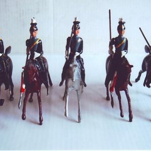 Britains # 100 21st Lancers. This was set # 2076 12th Lancers. Jeff  repainted the Plastrons and Cross belts & Plumes to convert them into the 21st La