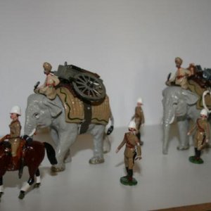 Under Two Flags - Elephants with gatling gun and supplies