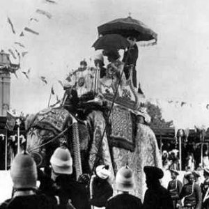 Lord and Lady Curzon on elephant; Coronation Durbar, Delhi, 1903