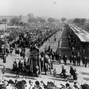 Viceroy Lord Curzon and Lady Curzon (C) making their sate entry on an elephant to Delhi Durbar.