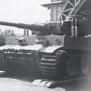 The general view of Tiger tank "#100". Moscow, the captured weapons exhibition, June 1943. 88-mm tank KwK gun shells mounted on the roof of the hull. 