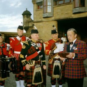 Edinburgh Tattoo RCR.Brig Mel Jamison giving The PM 2 RCR the plaque from the Edinburgh Tattoo 2002.I`m the tall one in the back ground.