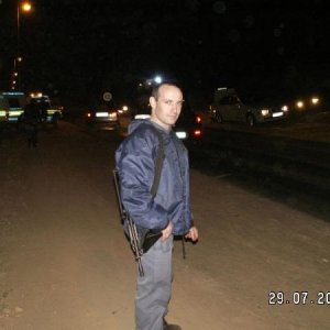 this is me , in winter , on a boring roadblock .... not looking 
too happy ... but im carrying a Z88 pistol (like the beretta 92FS) and an R5 assualt 