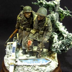 Battle of the Bulge : Village of Grandmenil dec 1944 
At the crossroad leading towards the villages of Erezée, Manay and Bomal two US soldiers are los