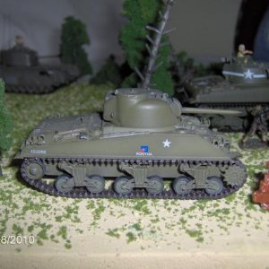 The two M4 Shermans and the Churchill tank surprise the Germans