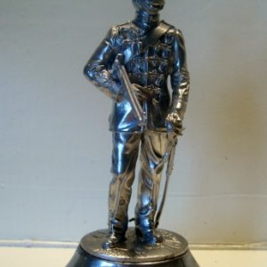 Chas Stadden. This is a Buckingham Pewter hallmarked model Titled the Queens Own Hussars. The reason I bought this is it has my old Regiment cap badge