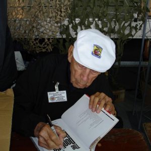 Lt. Col. Richard Cole
Doolittle Raid
Co Pilot on #1 palne with Doolittle as Pilot
Signing a copy of The Doolittle Raid for my collection