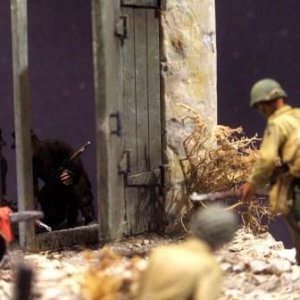 Taking of Gela - Germans are waiting behind the barn doors.