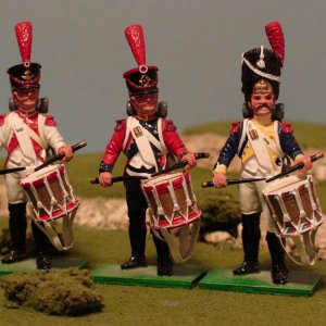 WA67 - Les Tambours 
57th Regiment of the Grenadiers - Bearskin, dark blue tunic
6th Regiment Foot Artillery - Shako, red tunic
17th Line Regiment - S