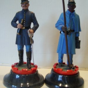 Chas Stadden ACW Chess Pieces Castles. On the right is Artilleryman 1st Tennessee Battery. On the left is Captain Hubert Dilger 1st Ohio Battery.