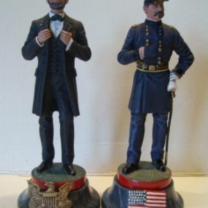 Chas Stadden ACW Chess pieces. King piece on the left is Abraham Lincoln. Queen piece on the right is Major General George B. McLellan.