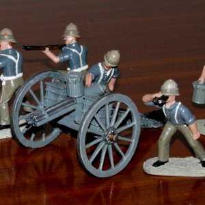 GATLING GUN

Comes with a lot of accessory barrels but painted in c1900 uniform of British Army overseas.
The two riflemen are actually accurate for t