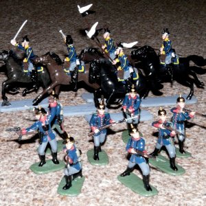 Infantry advance whilst cavalry skirts to rear.