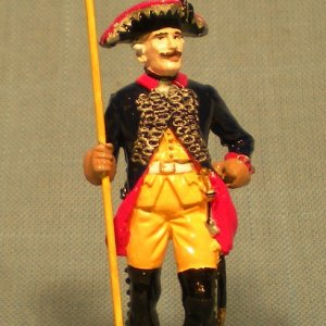 A Feldwebel, or sergeant, of Frederick's Regiment Garde (IR 15).  As the King's own regiment, it had the most elaborate dress uniforms in his army.  T