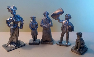 54mm civilians kits a 1800's woman, boy and woman singing, paper boy and his dog. Prices vary so please ask.