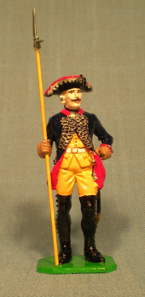 A Feldwebel, or sergeant, of Frederick's Regiment Garde (IR 15).  As the King's own regiment, it had the most elaborate dress uniforms in his army.  T