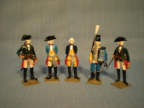 A group of figures by the German company Archiv Verlag.  From left to right, a Jäger; an officer of dragoons; an officer of the royal bodyguard regime