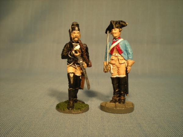 A pair of figures from the Franklin Mint, a Bayreuth dragoon, and a Death's Head hussar from the von Ruesch regiment (Nr.1).  These figures are from a