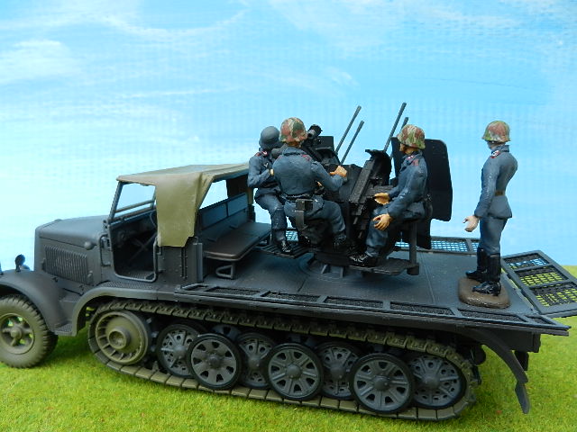 Achtung Spitfuer!
JCM Miniatures crew on FOV Flakvierling 1/2 track