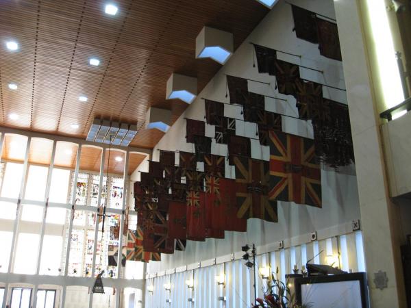 Battle flags from various regiments span hundreds of years