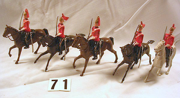 Britains # 2074 1st Kings Dragoon Guards. I have these tied in their box, but again best photo I can get for now.