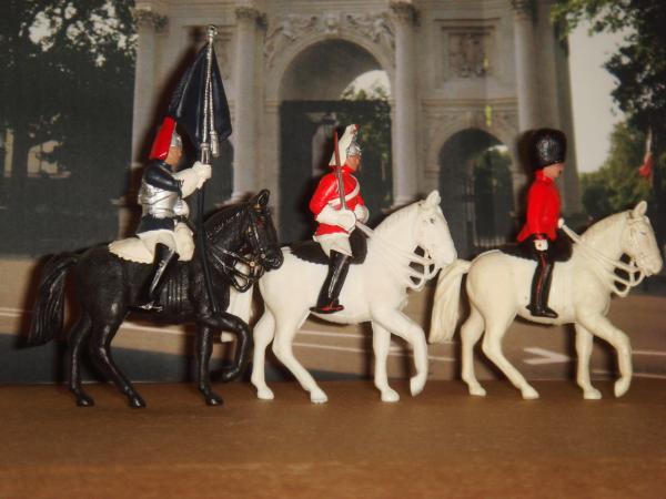 Britains/Herald

From L-R 
B&R Standard Bearer, Life Guard & Scots Guard