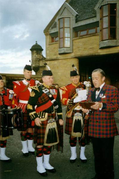 Edinburgh Tattoo RCR.Brig Mel Jamison giving The PM 2 RCR the plaque from the Edinburgh Tattoo 2002.I`m the tall one in the back ground.