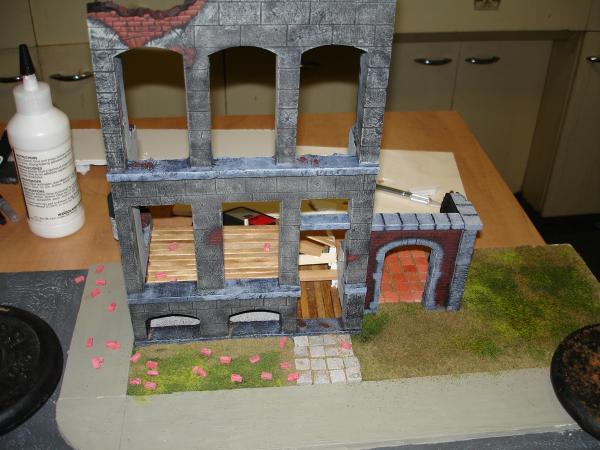 Front of building section on base 12"x24" with
grass, floor, paint, road done