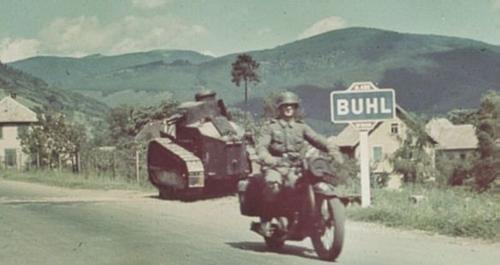 German dispatch rider passing a French FT 17