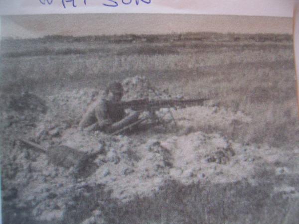 "Machine gun" John Watson,A master of the M60,In his hole near the Cambodian border.