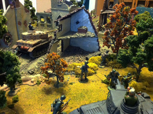 n6- Panzers moving into Village and moving to cover their Right flank into Village.