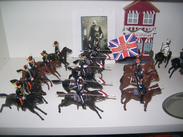 Restored old Britains in a light Brigade grouping,Most of these had arms,legs,tails,heads etc off,paint negligable to say the least.  Probably 15 more