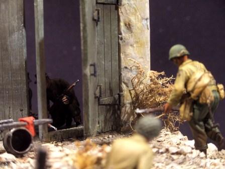 Taking of Gela - Germans are waiting behind the barn doors.