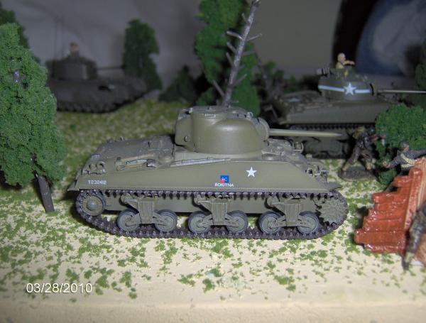 The two M4 Shermans and the Churchill tank surprise the Germans